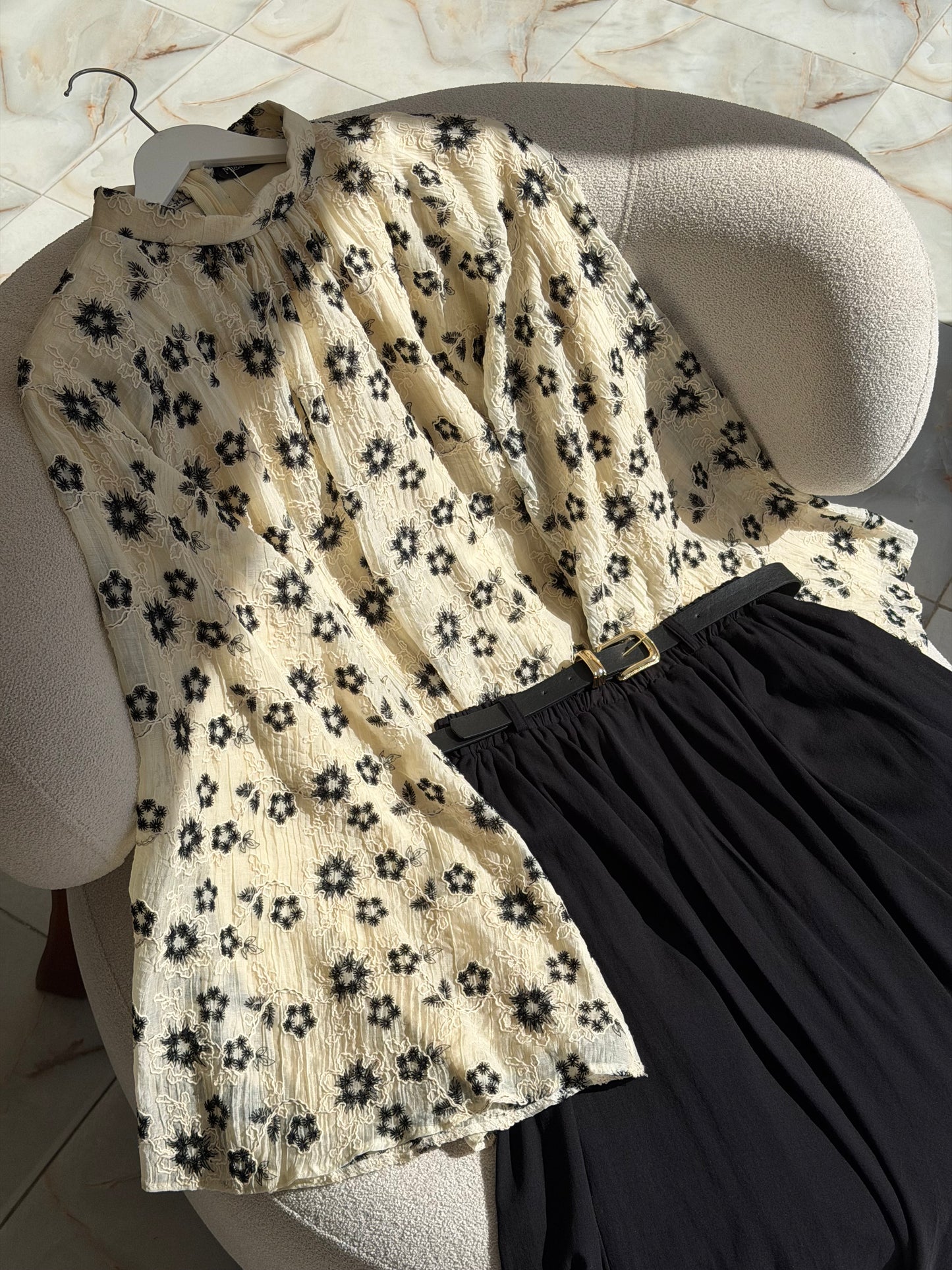 Embroidered blouse.