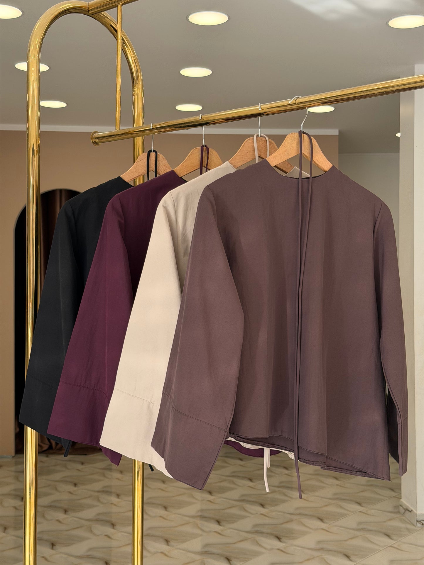 Oversized asymmetric blouse .