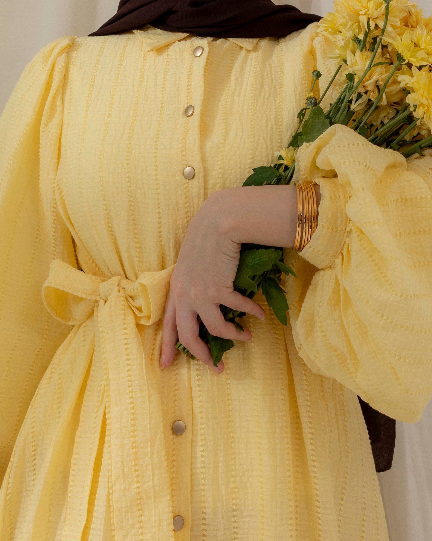 Elegant gold buttoned dress