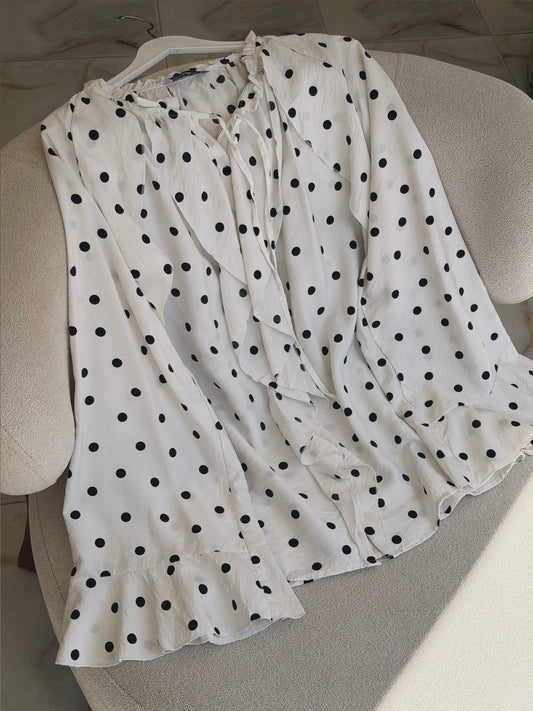 Polka dot ruffled blouse