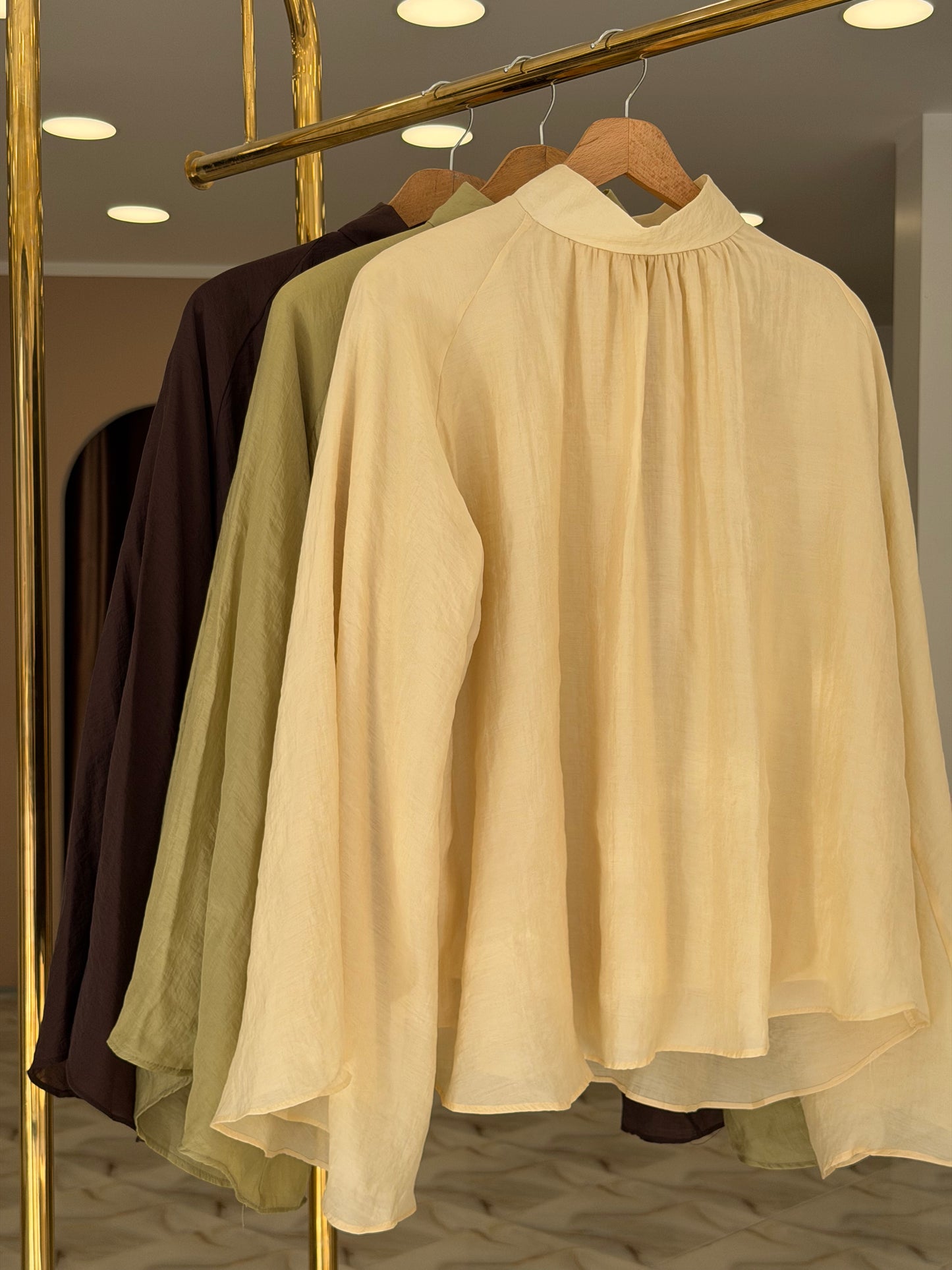 Oversized wide sleeve blouse.